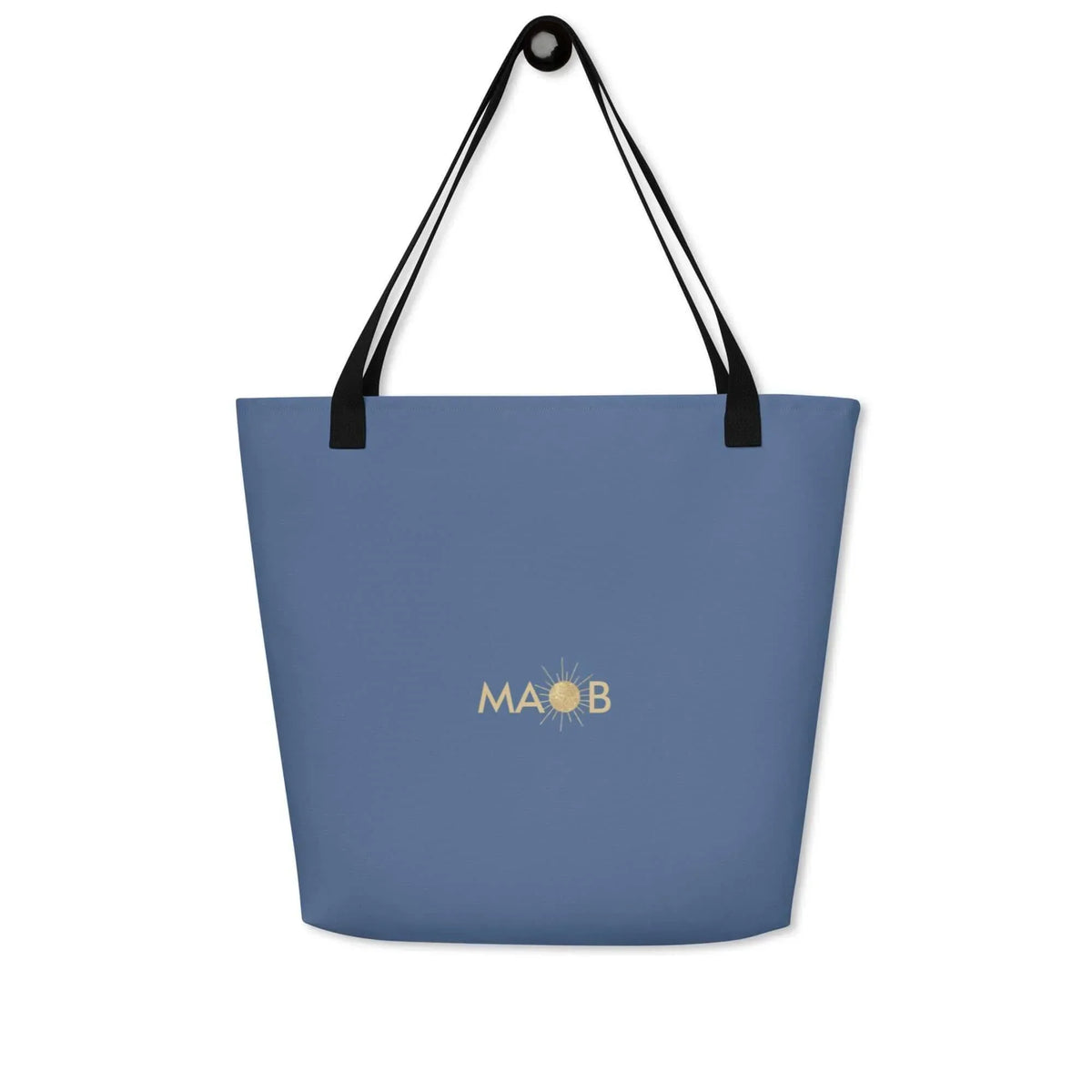 Blaue CREWILD Tragetasche mit goldfarbenem MAOB-Logo und Sonnen-Symbol