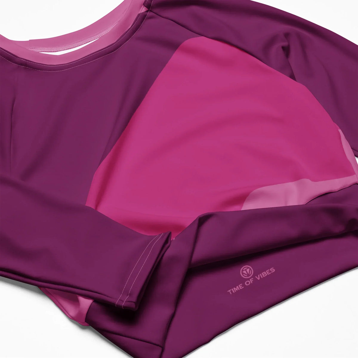 CREWILD Langarm Crop-Top in Pink mit abstraktem Design und Logo-Print