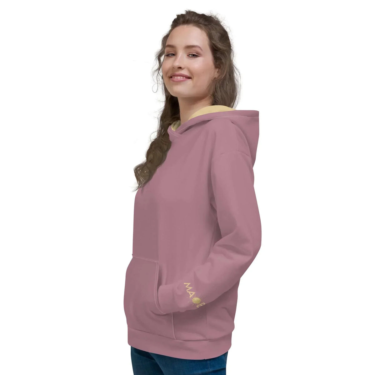 Frau trägt einen rosa CREWILD MAOB Hoodie in der Farbe Luft.