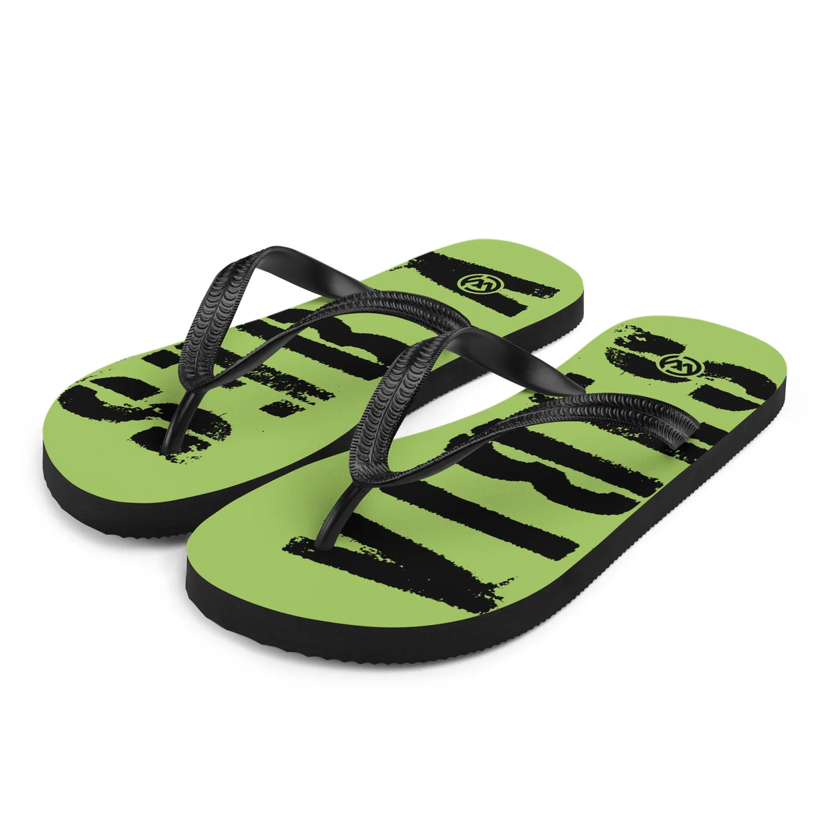 CREWILD Flip-Flops in Grün mit schwarzen Grafiken und schwarzen Riemen