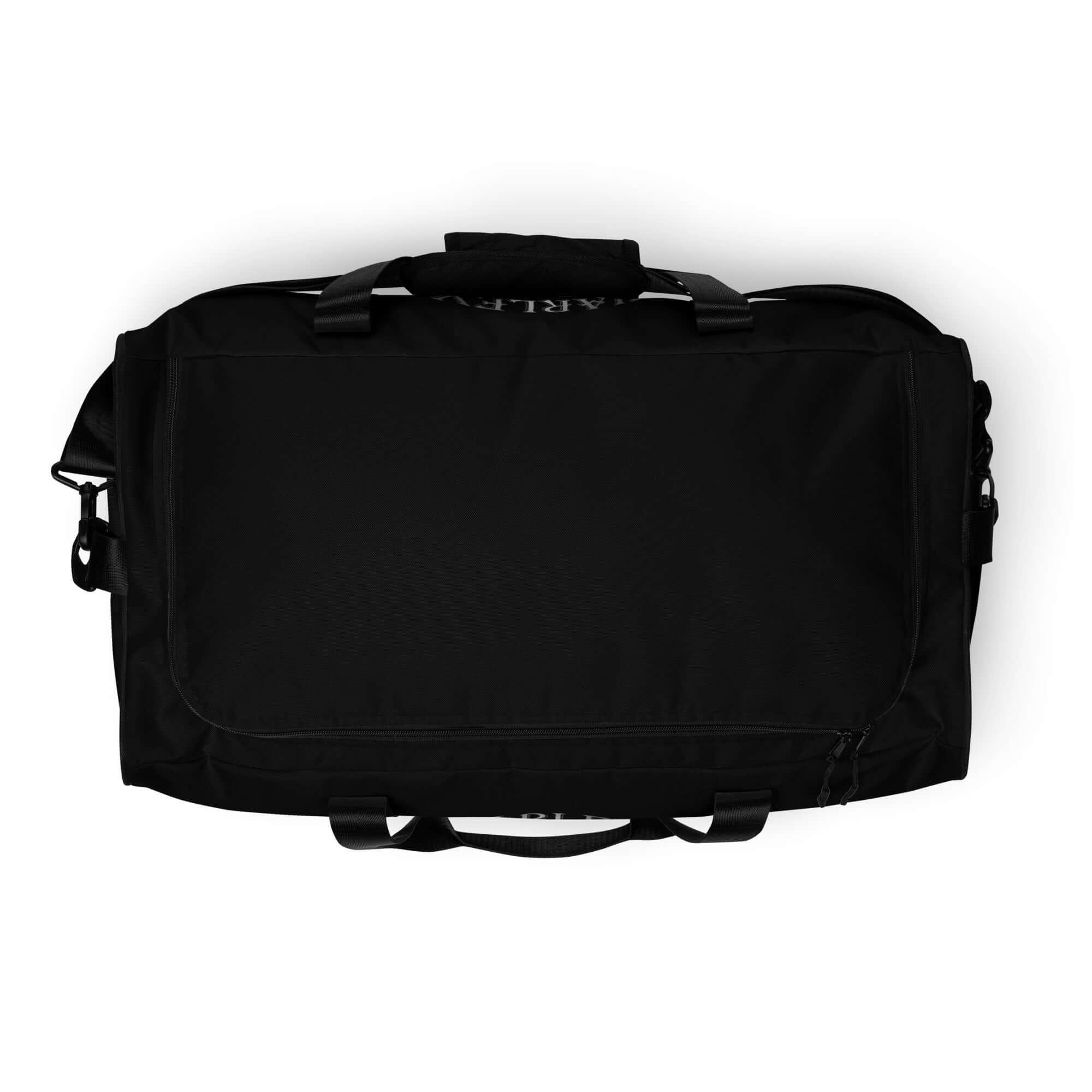 Schwarze Reisetasche aus Stoff mit zwei Griffen, minimalistische Sporttasche auf weißem Hintergrund.