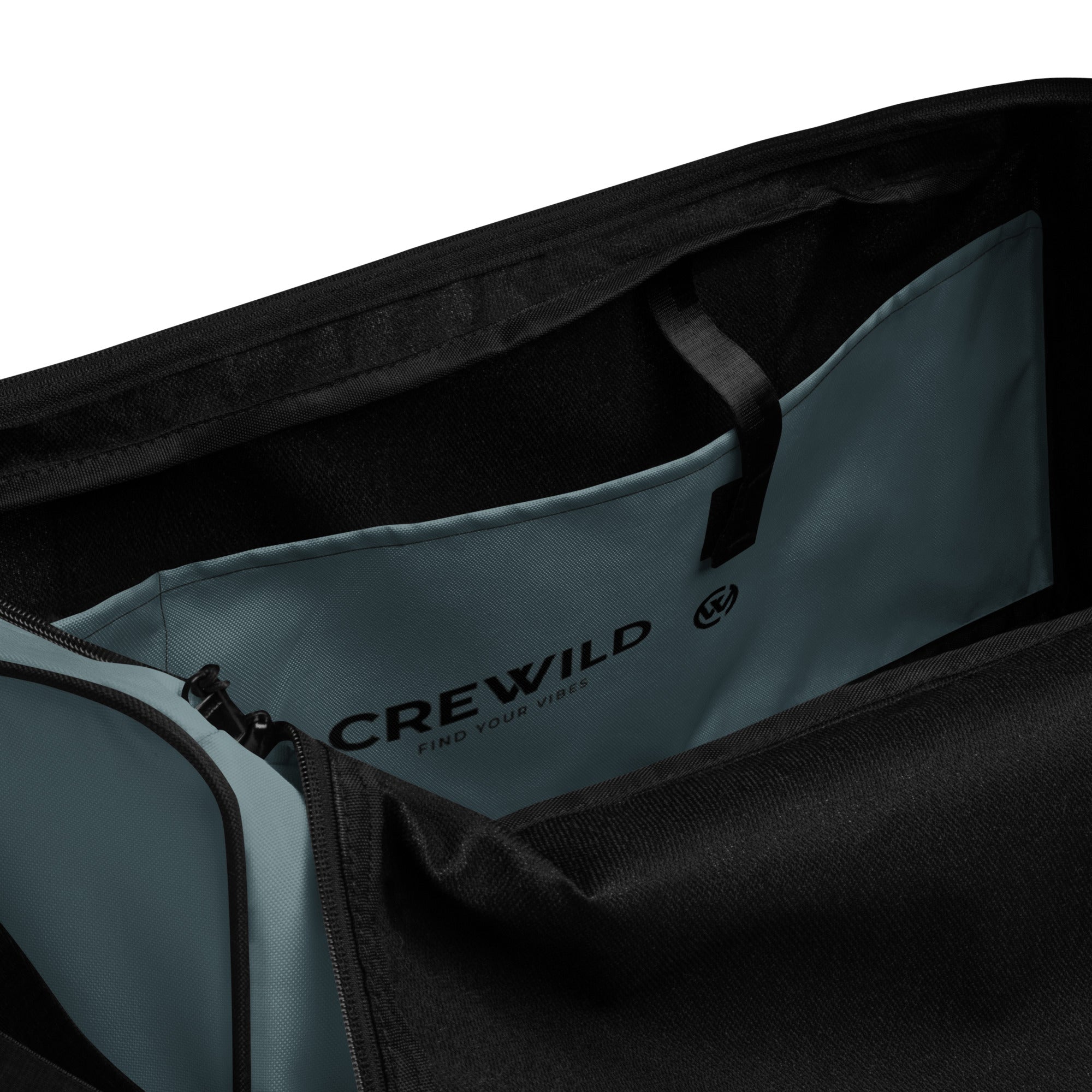 Innenansicht einer schwarzen Crewild Tasche mit grauem Innenfutter und Logo-Aufdruck