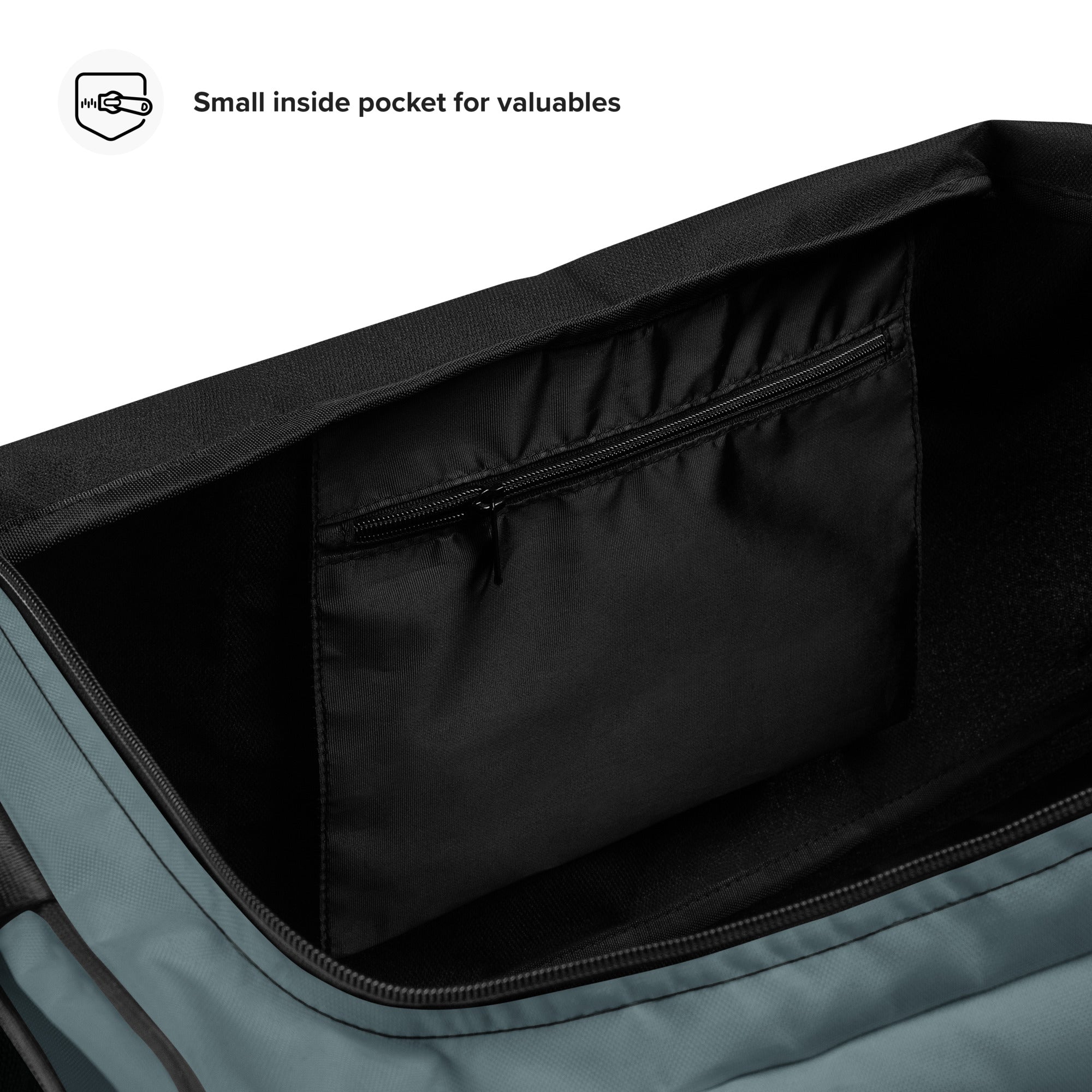 Detailansicht einer kleinen Innentasche mit Reißverschluss in einer grauen Tasche