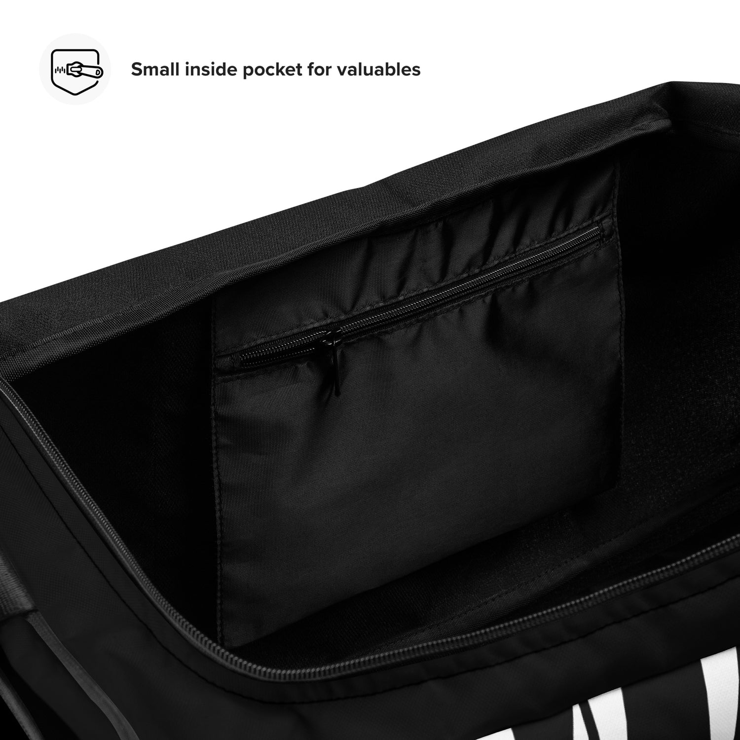 Innenansicht einer schwarzen Tasche mit einem kleinen Reißverschlussfach für Wertsachen.