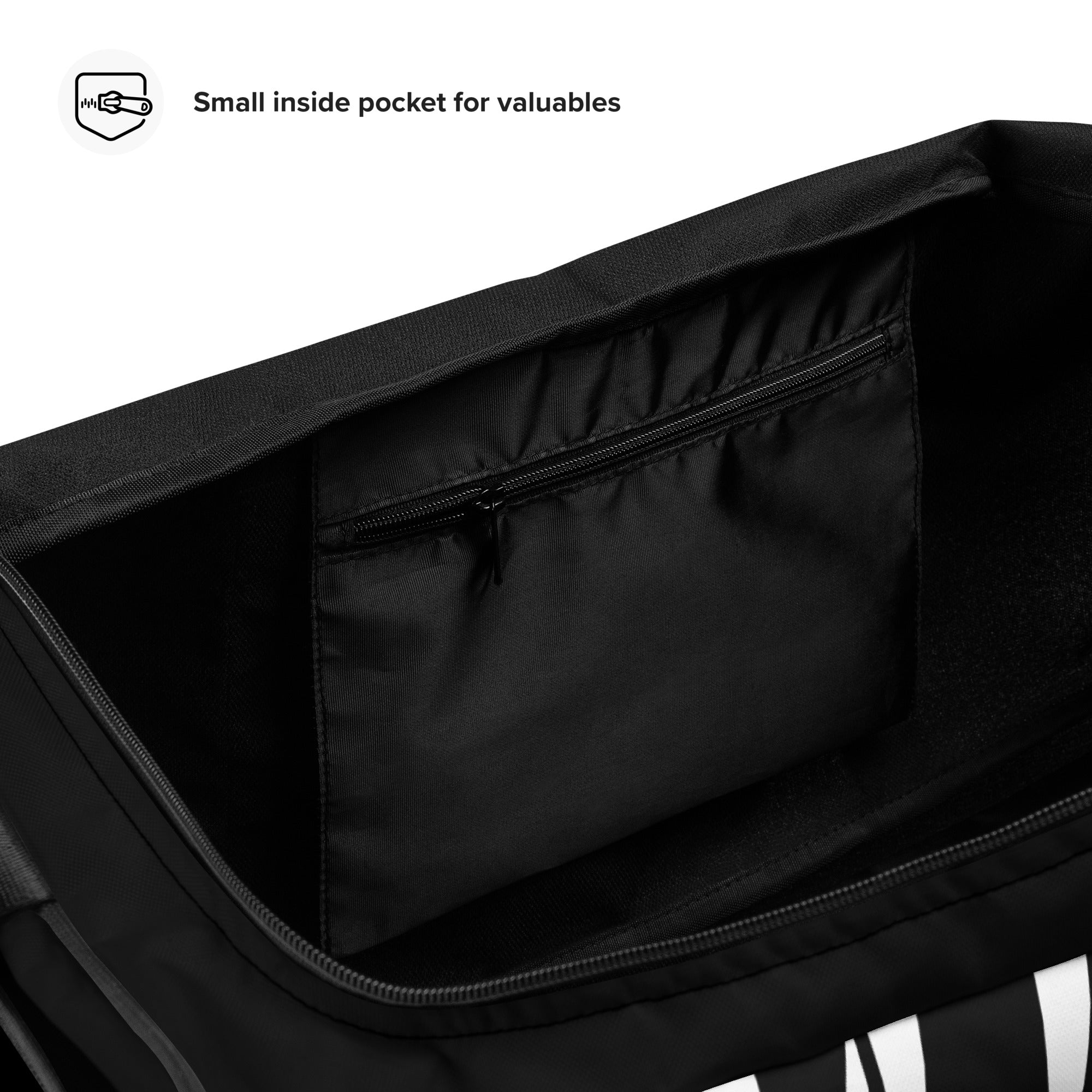 Innenansicht einer schwarzen Tasche mit einem kleinen Reißverschlussfach für Wertsachen.