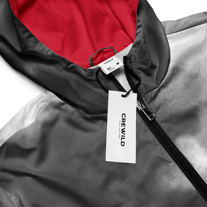 Detailansicht einer grauen Jacke mit rotem Innenfutter und Crewild-Etikett