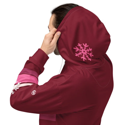 Seitliche Ansicht eines dunkelroten CREWILD Hoodies mit Schneeflocken-Print auf der Kapuze.