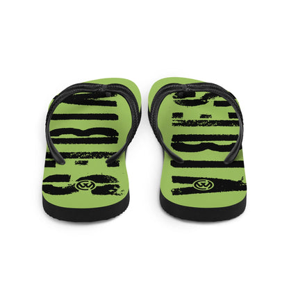 Grün-schwarze CREWILD Flip-Flops mit grafischem Muster und Logo