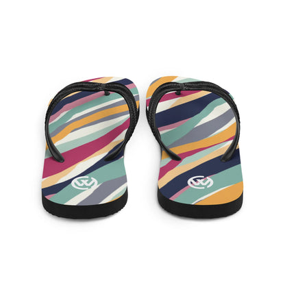 Bunte CREWILD Flip-Flops mit abstraktem Wellenmuster in Pastell- und kräftigen Farben.