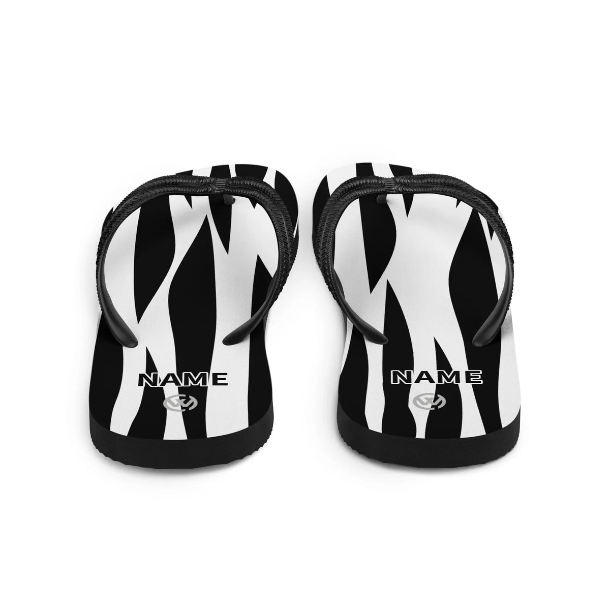 Personalisierbare CREWILD Flip-Flops mit schwarz-weißem Zebra-Muster und Namenszug.