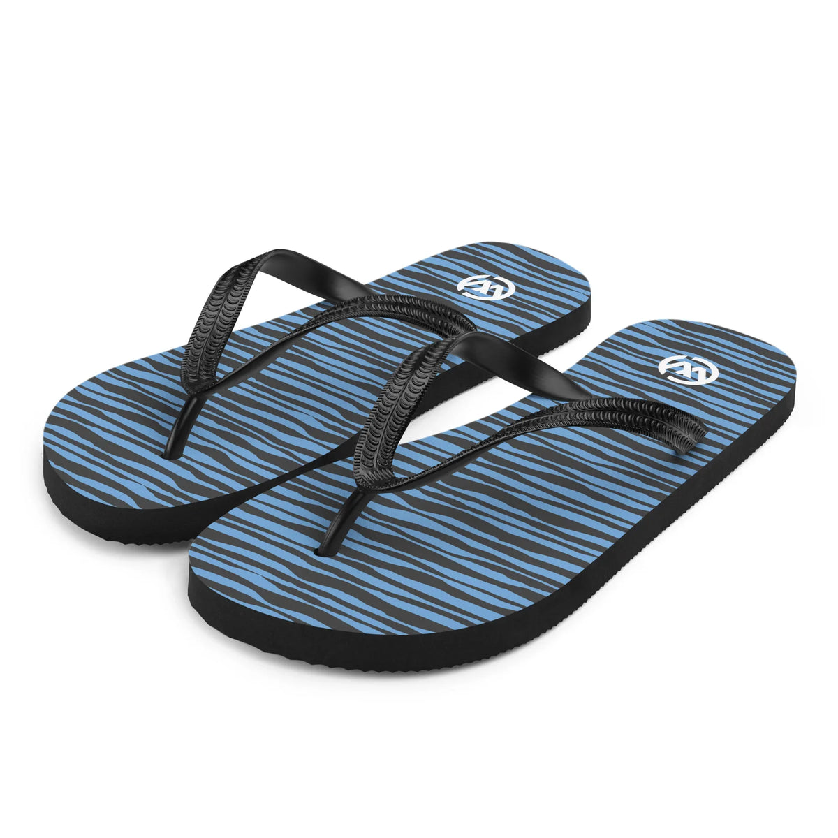 Blau-schwarze CREWILD Flip-Flops mit Wellenmuster und schwarzen Riemen