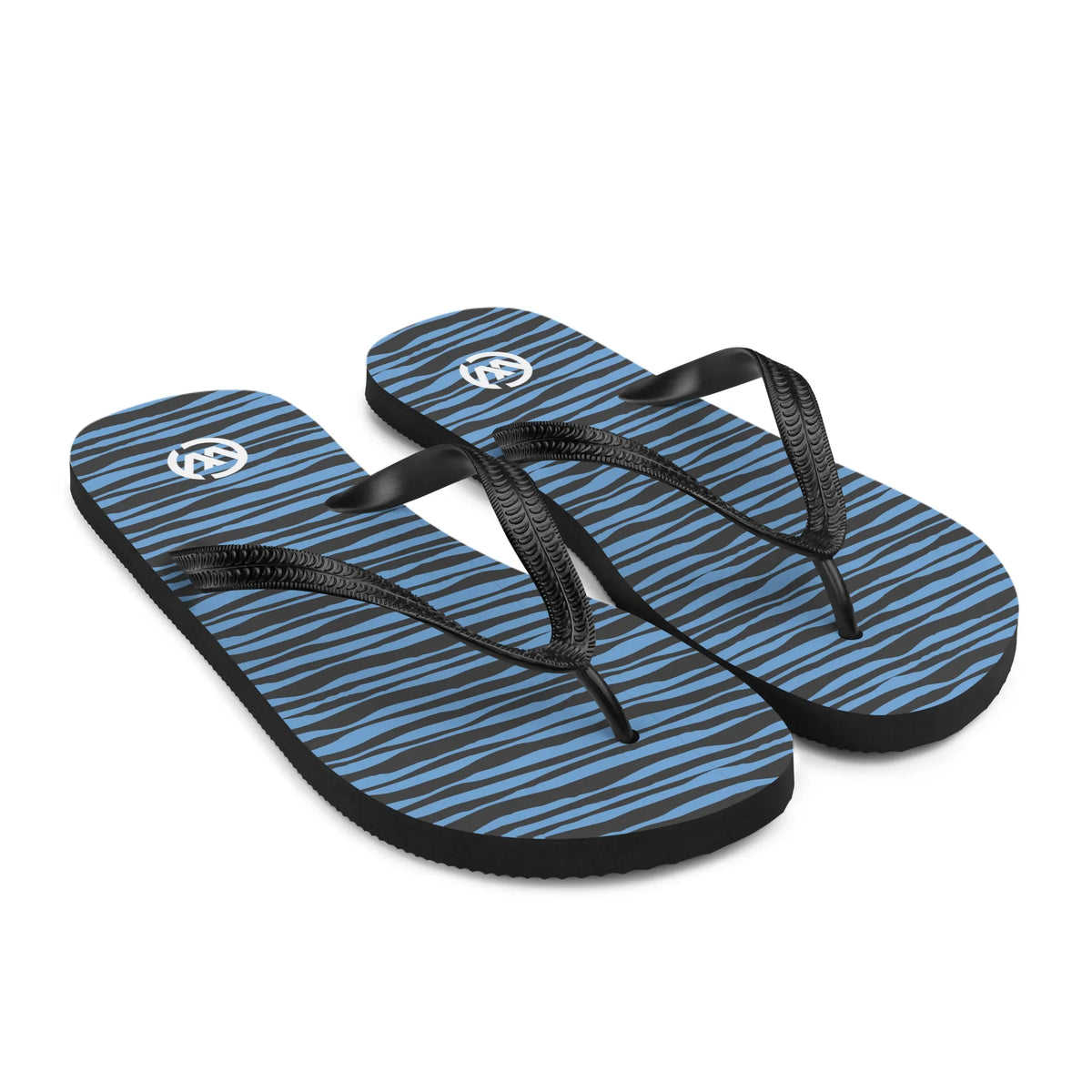 Blaue CREWILD Flip-Flops mit schwarz-blauen Wellenmustern und schwarzen Riemen.
