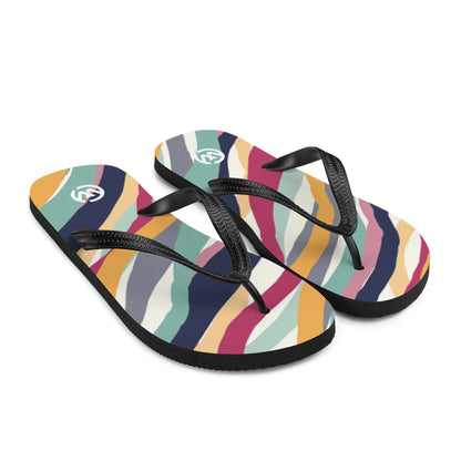 Bunte CREWILD Flip-Flops mit abstraktem Wellenmuster in verschiedenen Farben