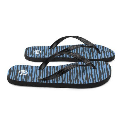 CREWILD Flip-Flops mit blau-schwarzem Wellenmuster und Logo