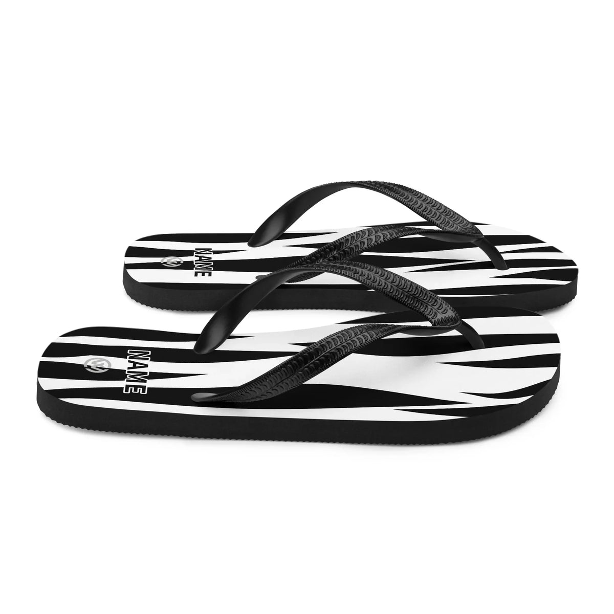 Personalisierbare CREWILD Flip-Flops im schwarz-weißen Zebra-Look mit Namensfeld