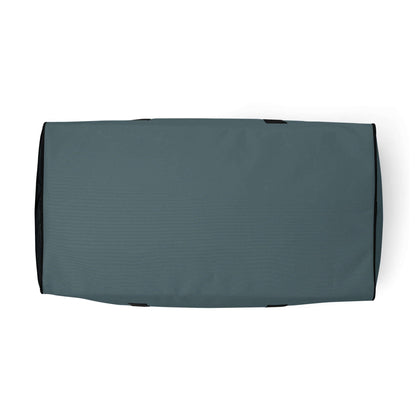 Unterseite einer grauen Sporttasche auf weißem Hintergrund, Duffle Bag Detailansicht