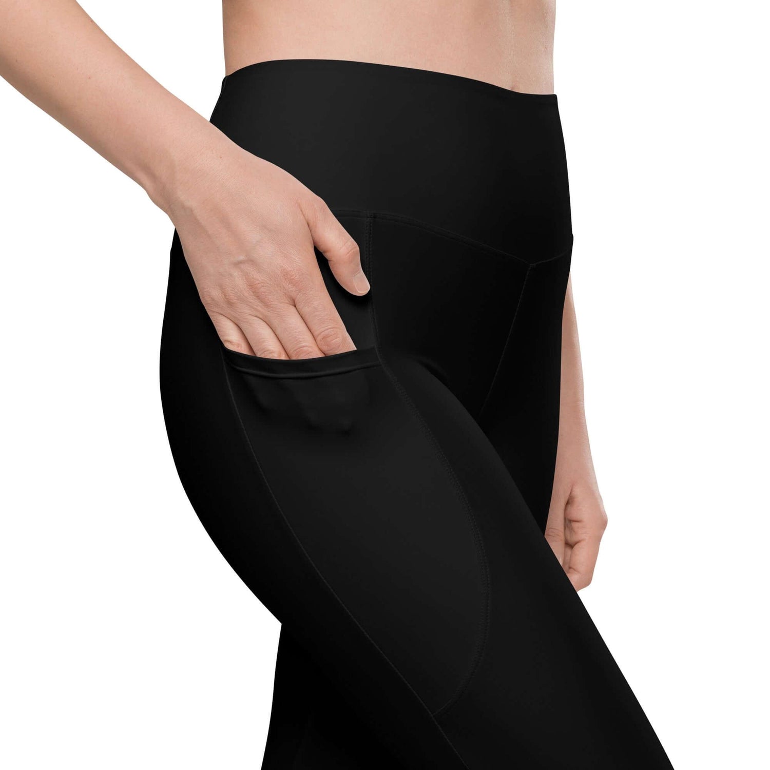 Damen Sportleggings mit Taschen in Schwarz, Nahaufnahme mit Hand in Seitentasche.