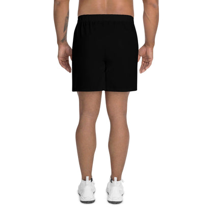 Rückansicht Herren Sportshorts schwarz, elastischer Bund, weißer Sportschuh, Studiohintergrund