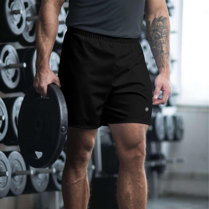 Mann in schwarzen Fitness-Shorts im Fitnessstudio mit Hantel, Sportbekleidung Herren