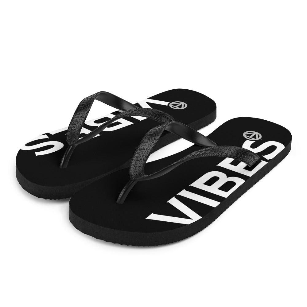 Schwarze Flip-Flops mit weißem Vibes-Print, schwarze Riemen, modernes Design